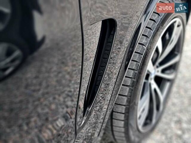 Черный БМВ Х5, объемом двигателя 3 л и пробегом 258 тыс. км за 34700 $, фото 29 на Automoto.ua