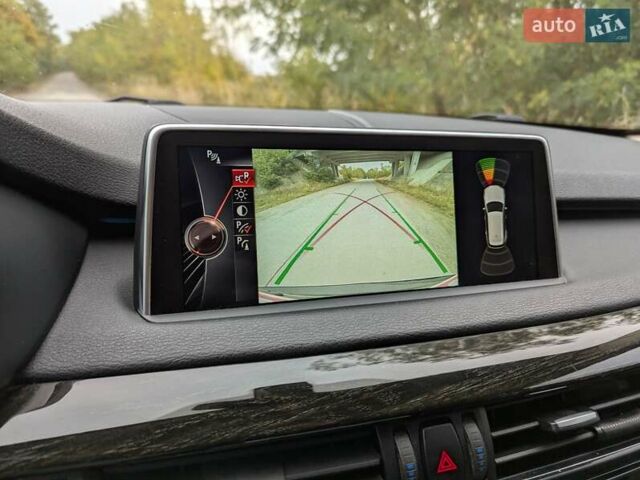 Черный БМВ Х5, объемом двигателя 3 л и пробегом 314 тыс. км за 16700 $, фото 30 на Automoto.ua