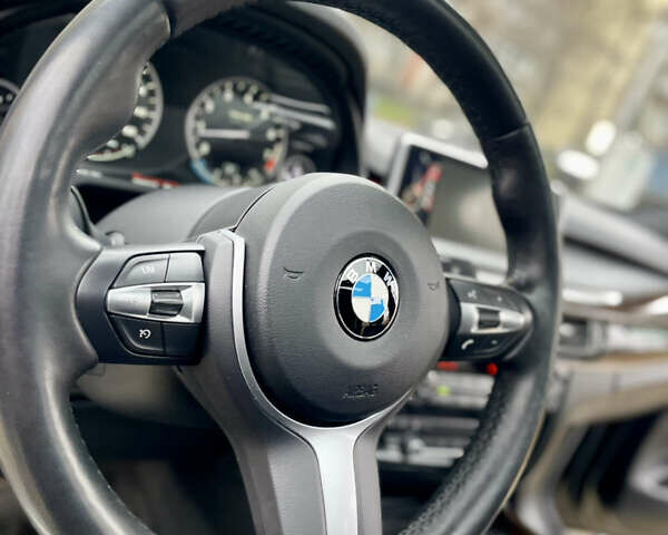 Черный БМВ Х5, объемом двигателя 3 л и пробегом 235 тыс. км за 17995 $, фото 45 на Automoto.ua