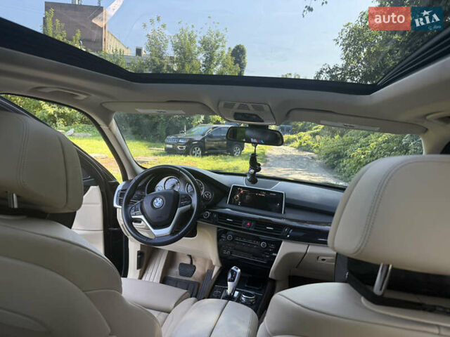Черный БМВ Х5, объемом двигателя 3 л и пробегом 107 тыс. км за 25500 $, фото 3 на Automoto.ua