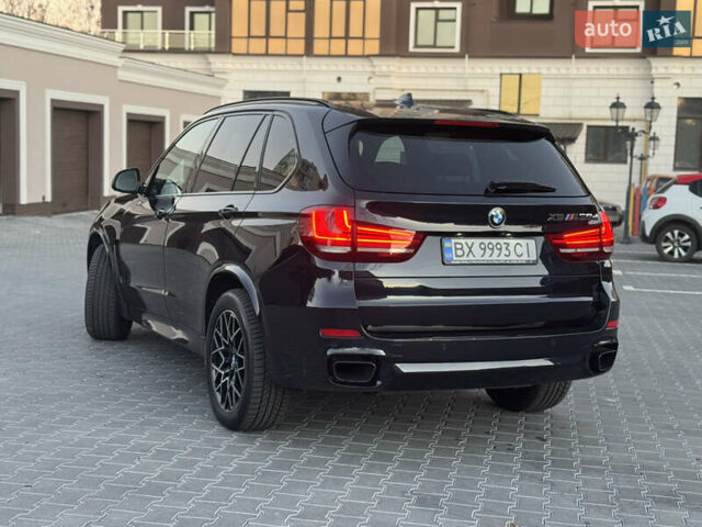 Чорний БМВ Х5, об'ємом двигуна 3 л та пробігом 250 тис. км за 34700 $, фото 4 на Automoto.ua