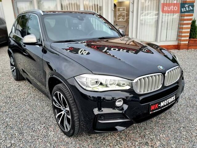 Черный БМВ Х5, объемом двигателя 3 л и пробегом 258 тыс. км за 34700 $, фото 1 на Automoto.ua