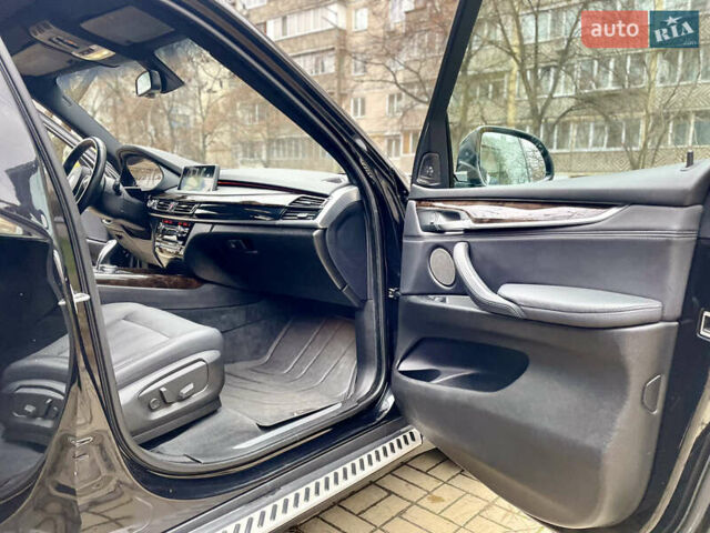 Черный БМВ Х5, объемом двигателя 3 л и пробегом 235 тыс. км за 17995 $, фото 22 на Automoto.ua
