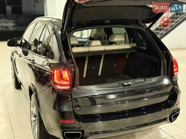 Черный БМВ Х5, объемом двигателя 3 л и пробегом 155 тыс. км за 25000 $, фото 6 на Automoto.ua