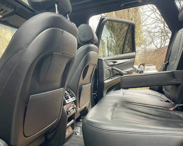 Черный БМВ Х5, объемом двигателя 3 л и пробегом 235 тыс. км за 17995 $, фото 52 на Automoto.ua