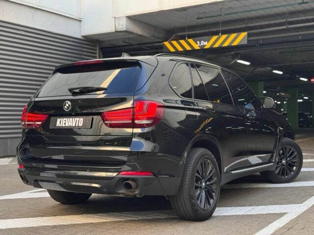 Черный БМВ Х5, объемом двигателя 3 л и пробегом 125 тыс. км за 22900 $, фото 2 на Automoto.ua