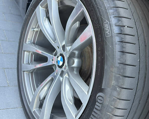 Черный БМВ Х5, объемом двигателя 3 л и пробегом 207 тыс. км за 35500 $, фото 60 на Automoto.ua