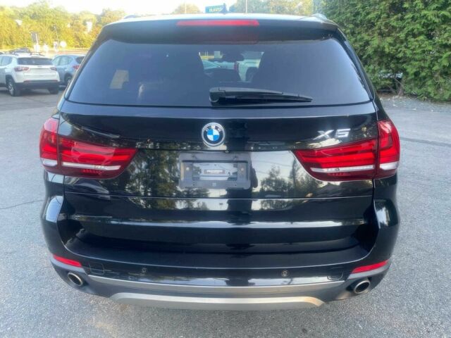 Чорний БМВ Х5, об'ємом двигуна 3 л та пробігом 90 тис. км за 16700 $, фото 3 на Automoto.ua