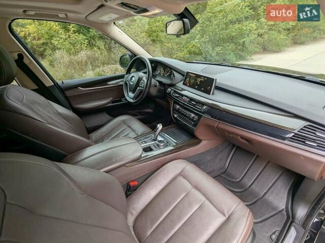 Черный БМВ Х5, объемом двигателя 3 л и пробегом 314 тыс. км за 16700 $, фото 18 на Automoto.ua