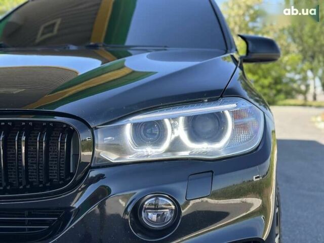Чорний БМВ Х5, об'ємом двигуна 3 л та пробігом 233 тис. км за 23999 $, фото 4 на Automoto.ua