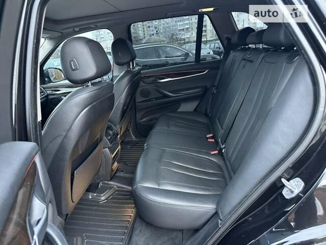 Черный БМВ Х5, объемом двигателя 3 л и пробегом 230 тыс. км за 32500 $, фото 3 на Automoto.ua