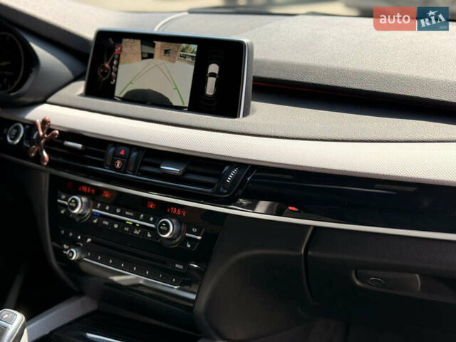 Черный БМВ Х5, объемом двигателя 3 л и пробегом 130 тыс. км за 39500 $, фото 17 на Automoto.ua