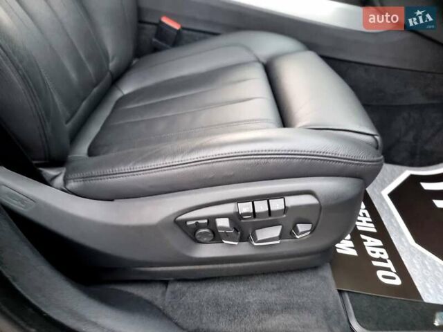 Черный БМВ Х5, объемом двигателя 3 л и пробегом 258 тыс. км за 34700 $, фото 78 на Automoto.ua