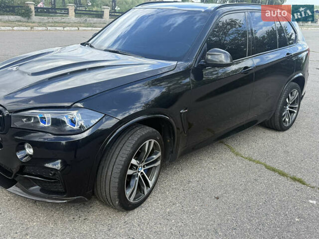 Черный БМВ Х5, объемом двигателя 3 л и пробегом 240 тыс. км за 31000 $, фото 3 на Automoto.ua