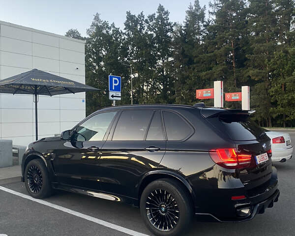 Черный БМВ Х5, объемом двигателя 2 л и пробегом 330 тыс. км за 31500 $, фото 3 на Automoto.ua