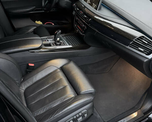 Черный БМВ Х5, объемом двигателя 3 л и пробегом 141 тыс. км за 41000 $, фото 12 на Automoto.ua