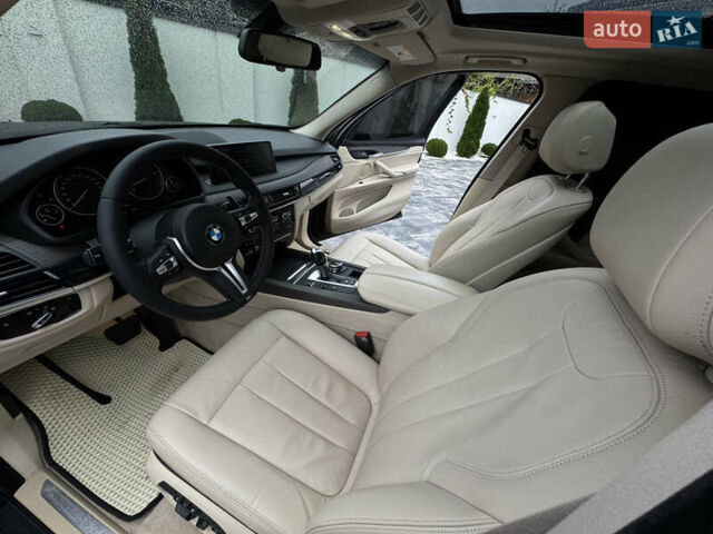 Черный БМВ Х5, объемом двигателя 3 л и пробегом 83 тыс. км за 23800 $, фото 41 на Automoto.ua