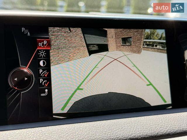 Черный БМВ Х5, объемом двигателя 3 л и пробегом 130 тыс. км за 39500 $, фото 30 на Automoto.ua