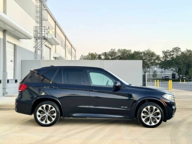 Чорний БМВ Х5, об'ємом двигуна 3 л та пробігом 100 тис. км за 15900 $, фото 7 на Automoto.ua