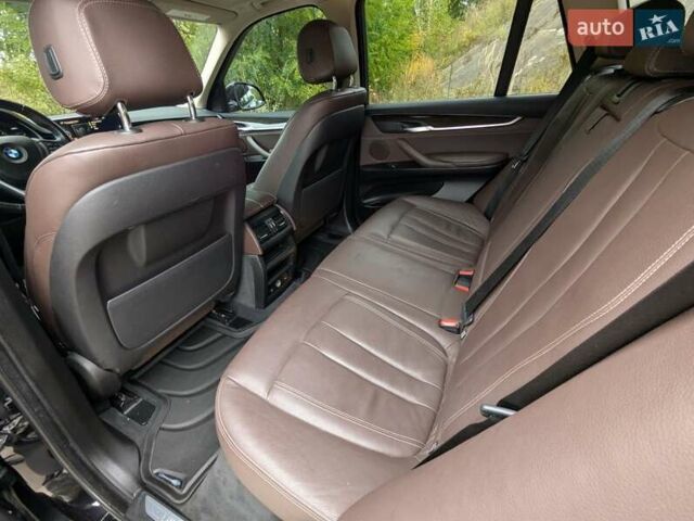 Черный БМВ Х5, объемом двигателя 3 л и пробегом 314 тыс. км за 16700 $, фото 22 на Automoto.ua
