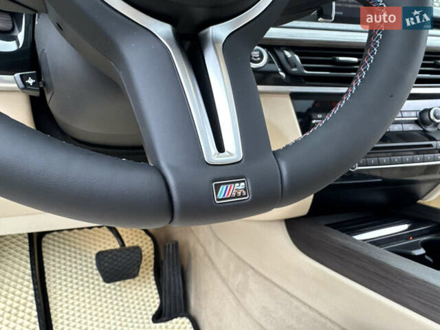 Черный БМВ Х5, объемом двигателя 3 л и пробегом 83 тыс. км за 23800 $, фото 64 на Automoto.ua