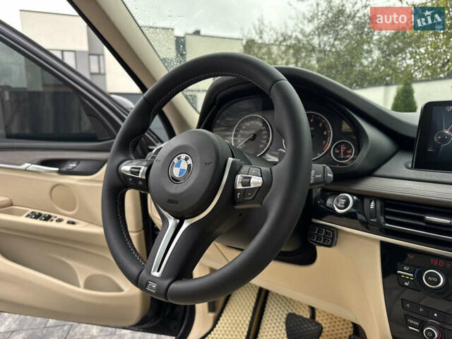 Черный БМВ Х5, объемом двигателя 3 л и пробегом 83 тыс. км за 23800 $, фото 62 на Automoto.ua