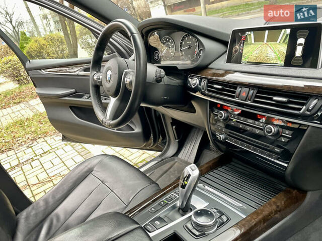 Черный БМВ Х5, объемом двигателя 3 л и пробегом 235 тыс. км за 17995 $, фото 28 на Automoto.ua
