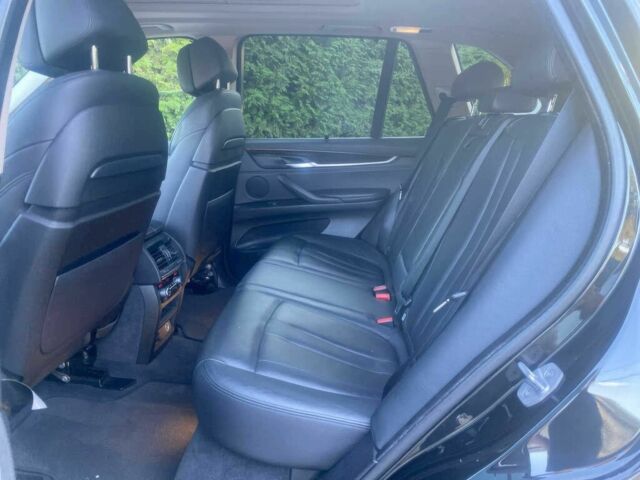 Чорний БМВ Х5, об'ємом двигуна 3 л та пробігом 90 тис. км за 16700 $, фото 10 на Automoto.ua