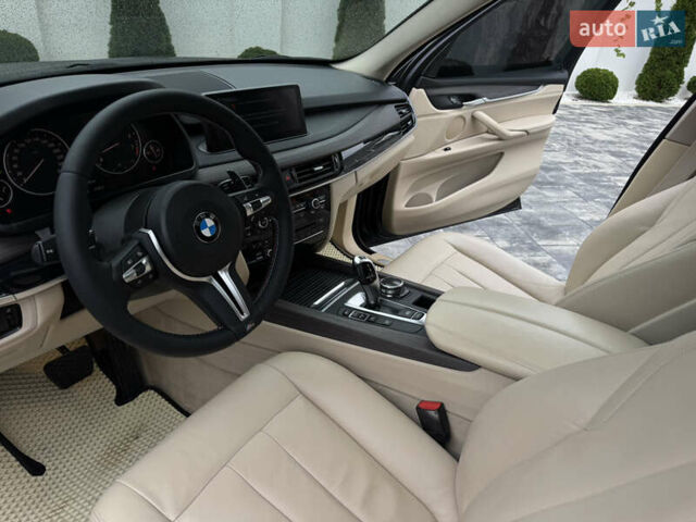 Черный БМВ Х5, объемом двигателя 3 л и пробегом 83 тыс. км за 23800 $, фото 42 на Automoto.ua