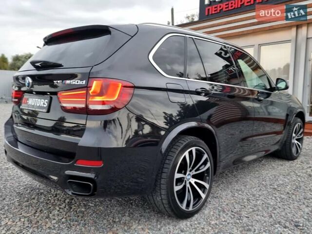 Черный БМВ Х5, объемом двигателя 3 л и пробегом 258 тыс. км за 34700 $, фото 2 на Automoto.ua