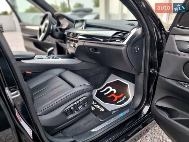 Черный БМВ Х5, объемом двигателя 3 л и пробегом 258 тыс. км за 34700 $, фото 77 на Automoto.ua