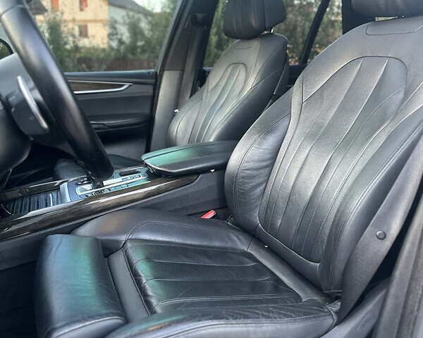Чорний БМВ Х5, об'ємом двигуна 3 л та пробігом 320 тис. км за 25950 $, фото 26 на Automoto.ua