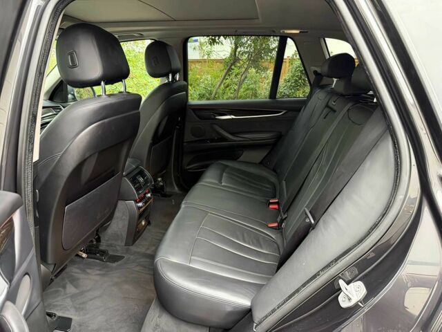 Черный БМВ Х5, объемом двигателя 3 л и пробегом 74 тыс. км за 5600 $, фото 12 на Automoto.ua