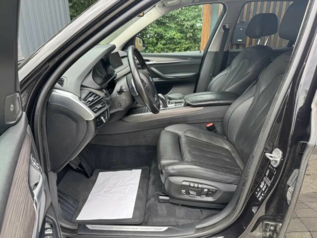 Чорний БМВ Х5, об'ємом двигуна 3 л та пробігом 73 тис. км за 11000 $, фото 4 на Automoto.ua