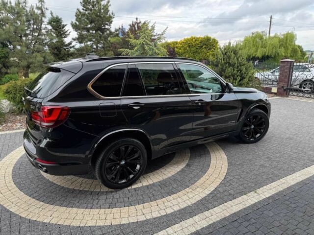 Чорний БМВ Х5, об'ємом двигуна 3 л та пробігом 120 тис. км за 18000 $, фото 3 на Automoto.ua