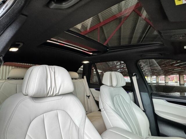 Чорний БМВ Х5, об'ємом двигуна 3 л та пробігом 201 тис. км за 29500 $, фото 4 на Automoto.ua