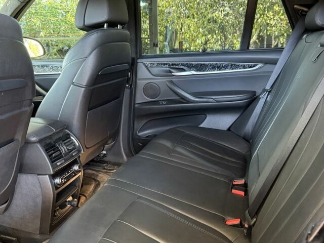 Чорний БМВ Х5, об'ємом двигуна 3 л та пробігом 217 тис. км за 26000 $, фото 5 на Automoto.ua