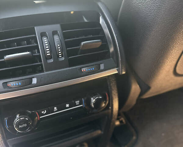 Чорний БМВ Х5, об'ємом двигуна 3 л та пробігом 320 тис. км за 25950 $, фото 28 на Automoto.ua