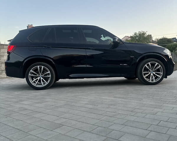 Чорний БМВ Х5, об'ємом двигуна 3 л та пробігом 320 тис. км за 25950 $, фото 6 на Automoto.ua