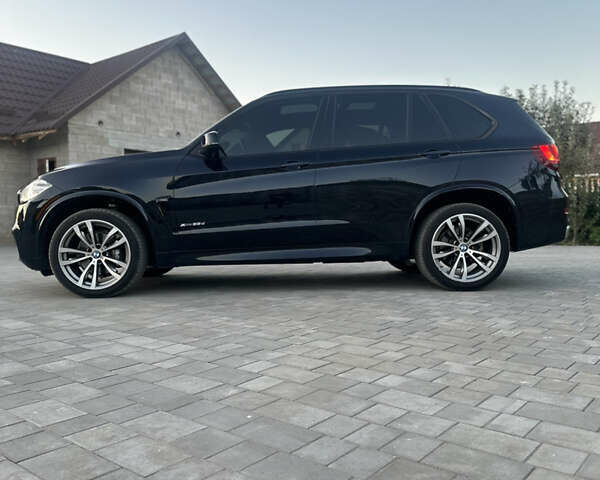 Чорний БМВ Х5, об'ємом двигуна 3 л та пробігом 320 тис. км за 25950 $, фото 46 на Automoto.ua