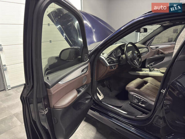 Чорний БМВ Х5, об'ємом двигуна 3 л та пробігом 218 тис. км за 33999 $, фото 69 на Automoto.ua