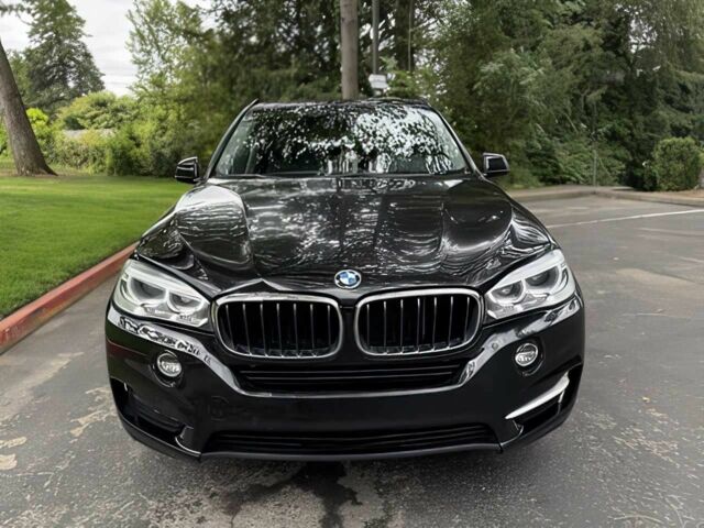 Чорний БМВ Х5, об'ємом двигуна 3 л та пробігом 75 тис. км за 25000 $, фото 1 на Automoto.ua