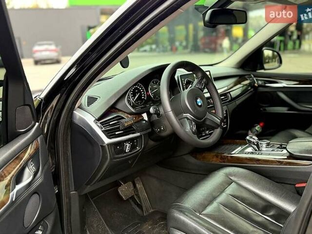 Черный БМВ Х5, объемом двигателя 3 л и пробегом 152 тыс. км за 24500 $, фото 5 на Automoto.ua
