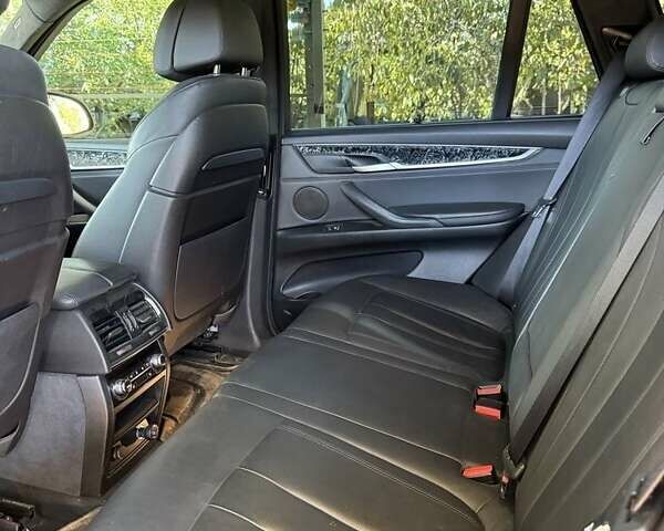 Черный БМВ Х5, объемом двигателя 3 л и пробегом 217 тыс. км за 26000 $, фото 4 на Automoto.ua