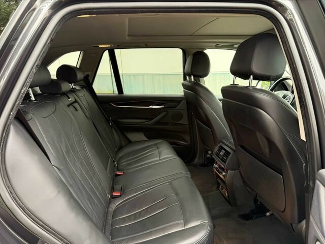 Черный БМВ Х5, объемом двигателя 3 л и пробегом 74 тыс. км за 5600 $, фото 13 на Automoto.ua