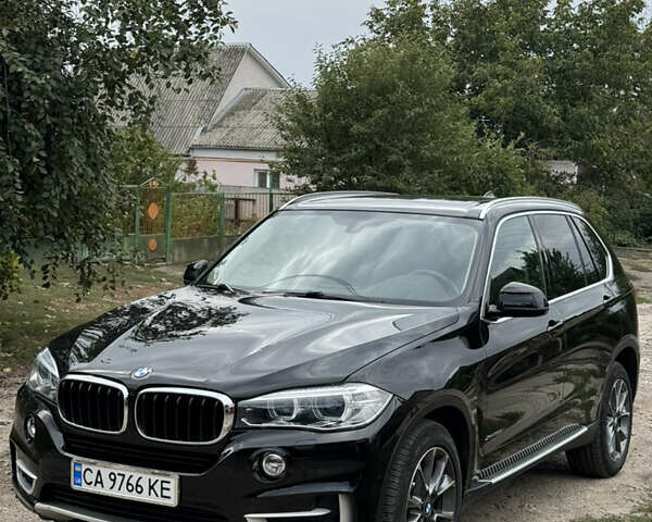 Черный БМВ Х5, объемом двигателя 3 л и пробегом 170 тыс. км за 32500 $, фото 2 на Automoto.ua