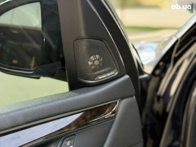 Черный БМВ Х5, объемом двигателя 3 л и пробегом 113 тыс. км за 24900 $, фото 21 на Automoto.ua