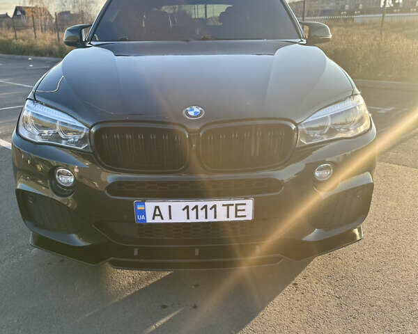 Черный БМВ Х5, объемом двигателя 3 л и пробегом 178 тыс. км за 34500 $, фото 4 на Automoto.ua