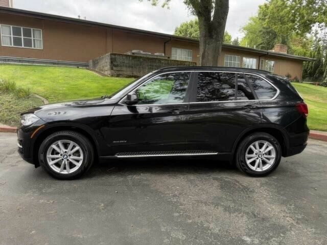 Чорний БМВ Х5, об'ємом двигуна 3 л та пробігом 77 тис. км за 11200 $, фото 3 на Automoto.ua