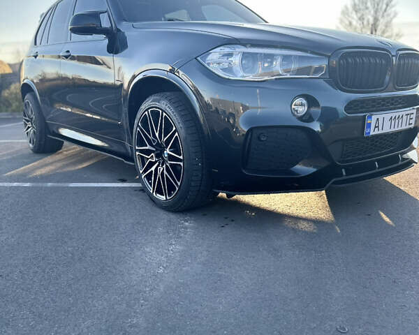 Черный БМВ Х5, объемом двигателя 3 л и пробегом 178 тыс. км за 34500 $, фото 2 на Automoto.ua